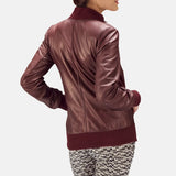 The fashionable maroon leather jacket ladies, exuding confidence and a touch of edginess.