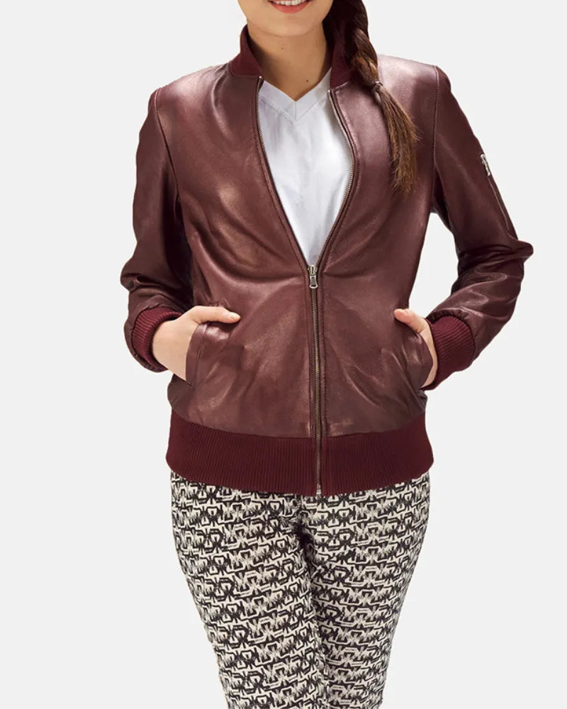 The fashionable maroon leather jacket ladies, exuding confidence and a touch of edginess.