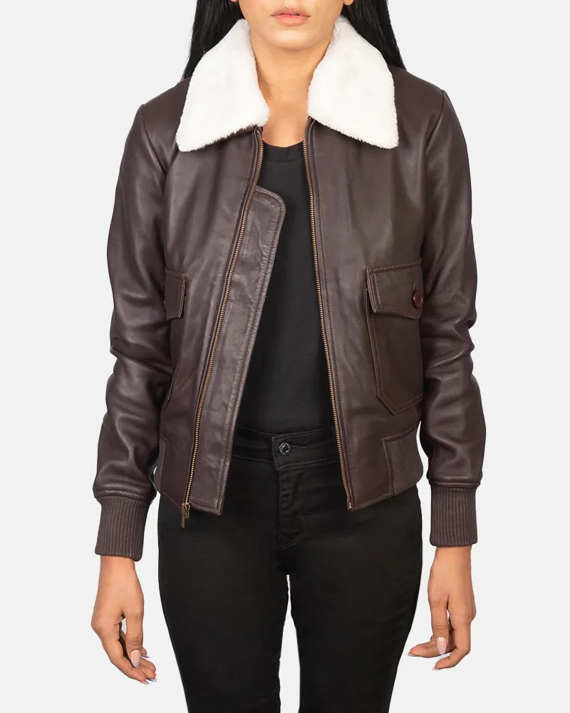 A stylish maroon leather jacket women with a collar and cuffs, perfect for adding a touch of elegance to any outfit.