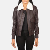 A stylish maroon leather jacket women with a collar and cuffs, perfect for adding a touch of elegance to any outfit.