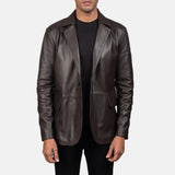 A fashion-forward man embraces his coolness in a men's brown leather blazer jacket.