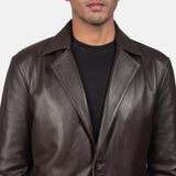 A fashion-forward man embraces his coolness in a men's brown leather blazer jacket.