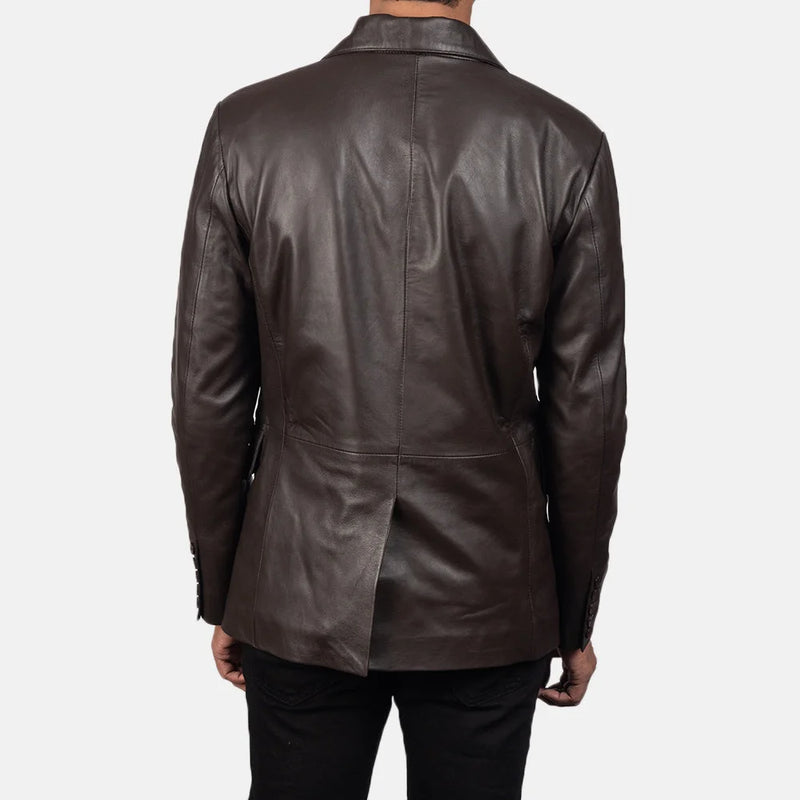 A fashion-forward man embraces his coolness in a men's brown leather blazer jacket.