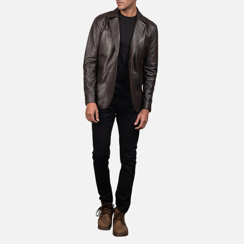 A fashion-forward man embraces his coolness in a men's brown leather blazer jacket.