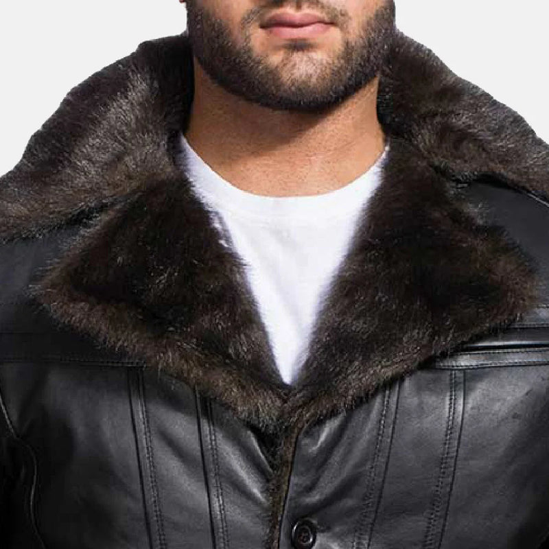 Stylish black men's leather coat with fur collar, perfect for staying warm in the cold weather.