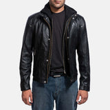 A stylish man in a leather men's motorcycle jacket black, exuding confidence and adding a touch of edginess to his look.