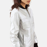 Check out this fashion-forward shiny metallic silver leather jacket, making a bold statement with the outfit.