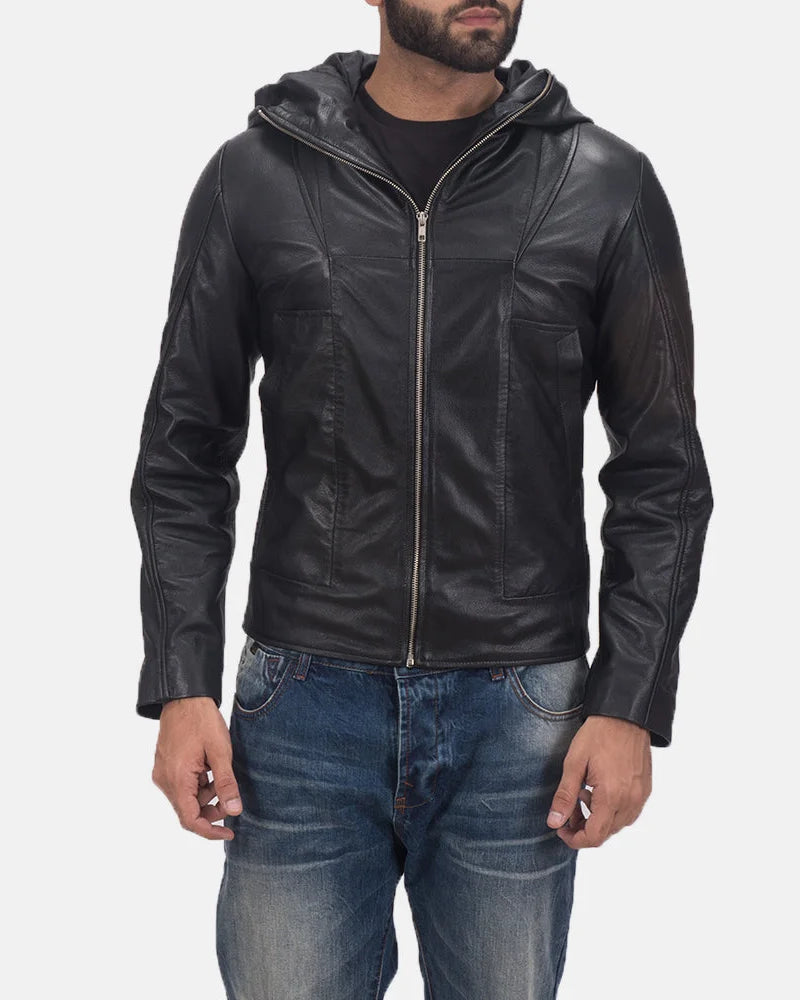 A fashionable man rocking a black quilted leather bomber jacket, adding an edgy touch to his ensemble.