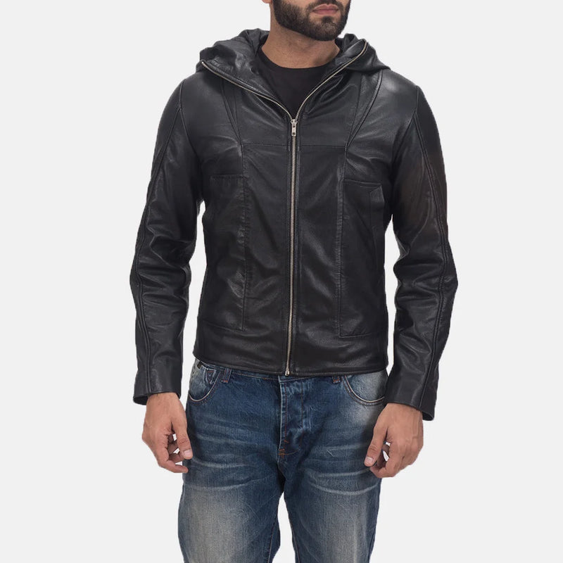 A fashionable man rocking a black quilted leather bomber jacket, adding an edgy touch to his ensemble.
