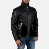 A stylish quilted black leather jacket with a zipper and a collar, perfect for adding a touch of coolness to any outfit.