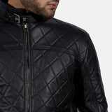 A stylish quilted black leather jacket with a zipper and a collar, perfect for adding a touch of coolness to any outfit.