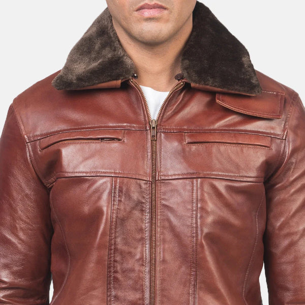 Stylish quilted brown leather jacket with zipper details, perfect for a cool and edgy look.