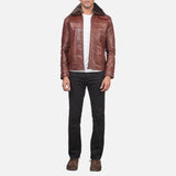 Stylish quilted brown leather jacket with zipper details, perfect for a cool and edgy look.