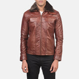 Stylish quilted brown leather jacket with zipper details, perfect for a cool and edgy look.