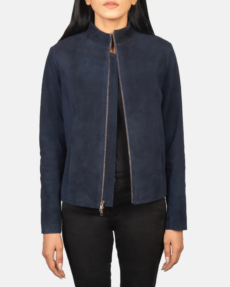 A stylish model wearing a suede jacket blue with zippers. Perfect for a trendy and fashionable look