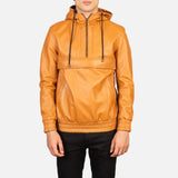 This is a stylish tan leather bomber jacket, adding a touch of sophistication to the ensemble.