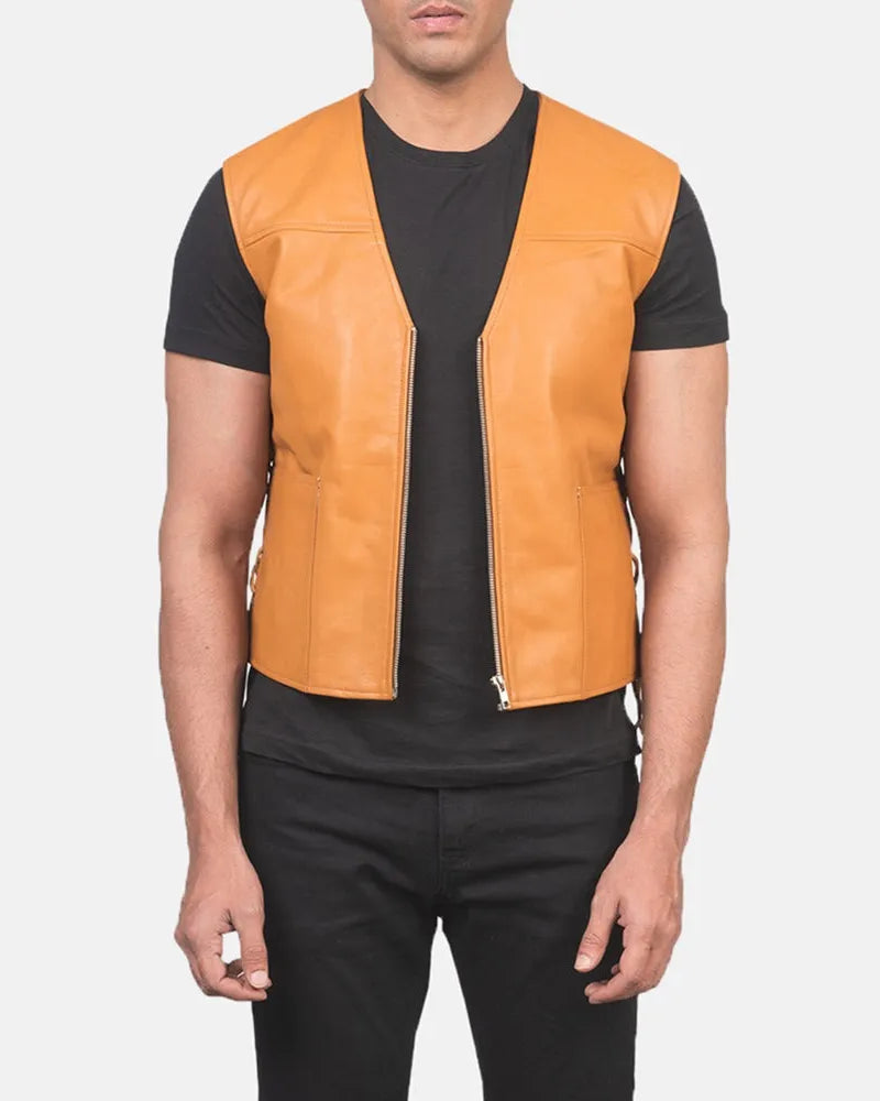 A leather vest, adds a touch of style to outfit with a trendy tan colour leather jacket.