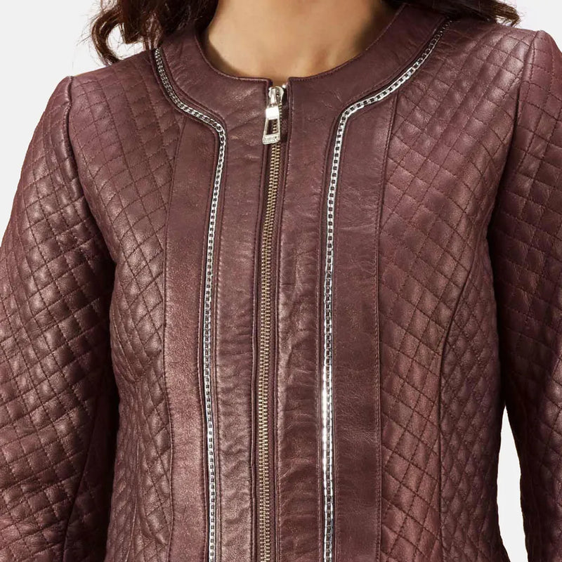 A stylish model showcasing a burgundy leather trench coat women.