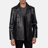 A man wearing a vintage black leather jacket, exuding a timeless and stylish appeal.