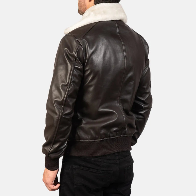 Classic men's brown leather vintage bomber jacket featuring a white collar, exuding a vintage vibe.