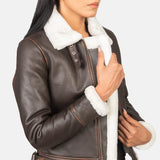 A stylish women's leather bomber jacket crafted from brown leather