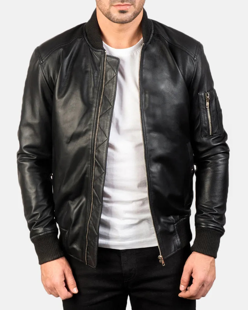 Black leather boys bomber jacket, perfect for men. Also suitable for boys. Stylish and versatile outerwear option.