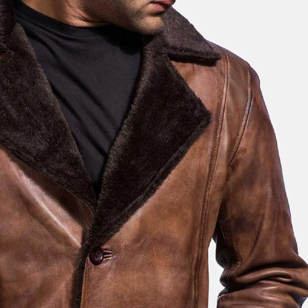 A stylish Men's Cinnamon Brown Leather Coat with Fur, it's a must-have for any fashion-forward individual.