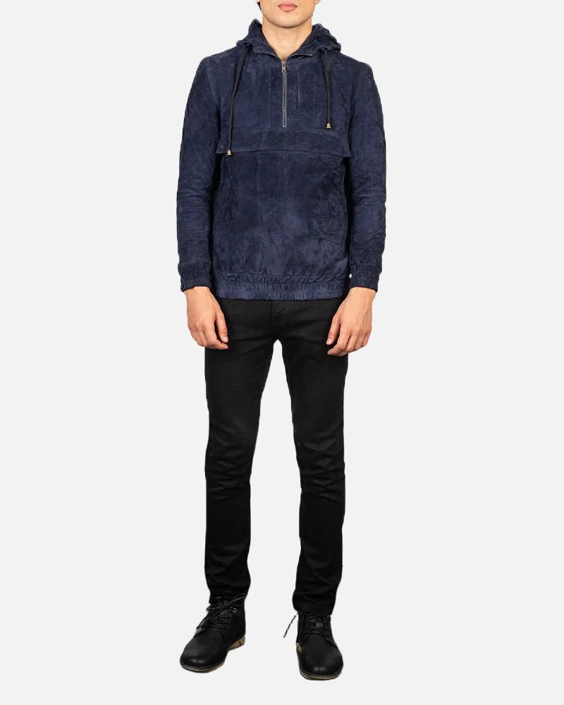  The man in the picture is sporting a trendy navy blue bomber jacket, adding a touch of fashion to his look.