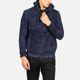  The man in the picture is sporting a trendy navy blue bomber jacket, adding a touch of fashion to his look.