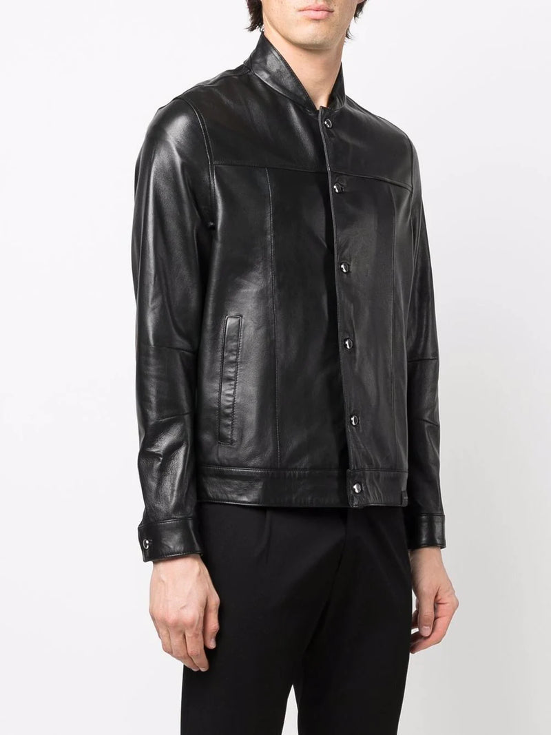 Showcasing trendy black leather shirt jacket and pants.